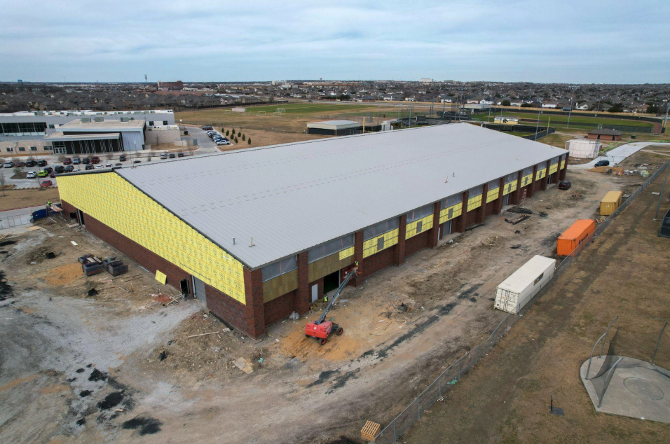 External view of near completed Fossil Ridge Indoor Extracurricular Program Facility.