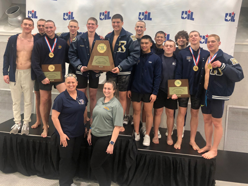 KHS Boys Swim team poses with their state championship trophy