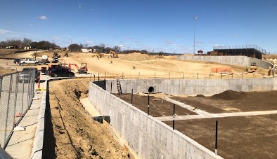 Construction on retaining walls alongside new KCAL parking lot