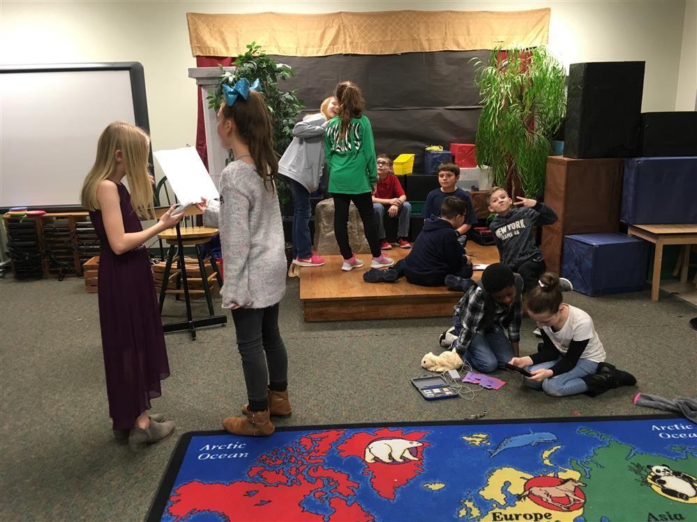Kids working in the drama room