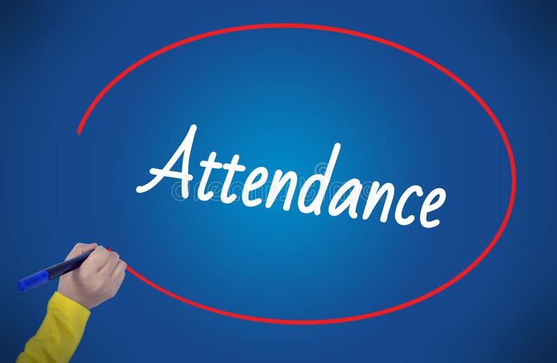  hand writing the word attendance on a blackboard