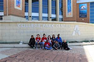 Students in front of College Park Center UTA 